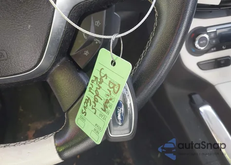 2012 Ford Focus Titanium z USA, uszkodzony, nr VIN 1FAHP3J24CL210299